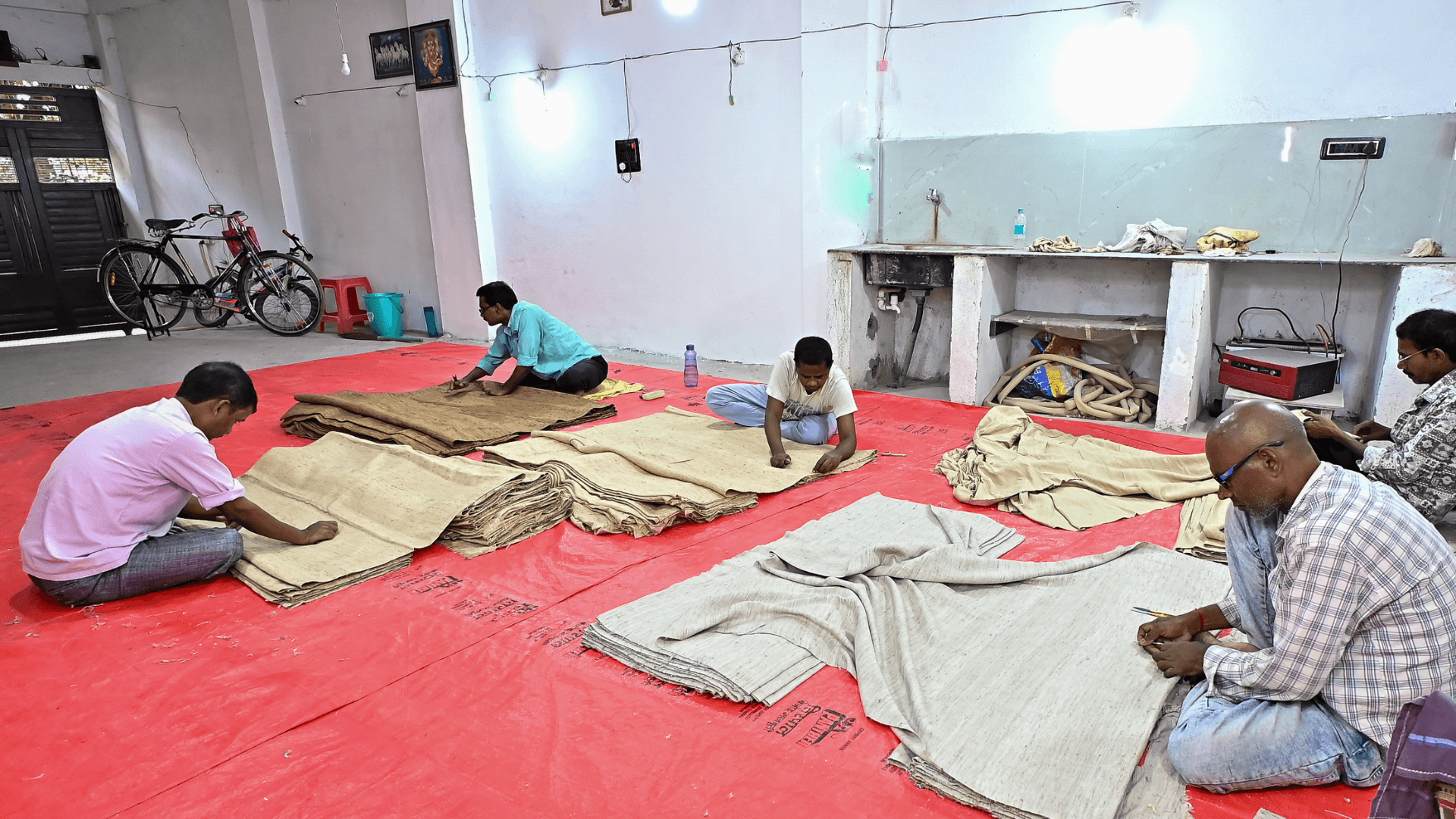 Titico Collections — artisan weaving in Varanasi loom hall